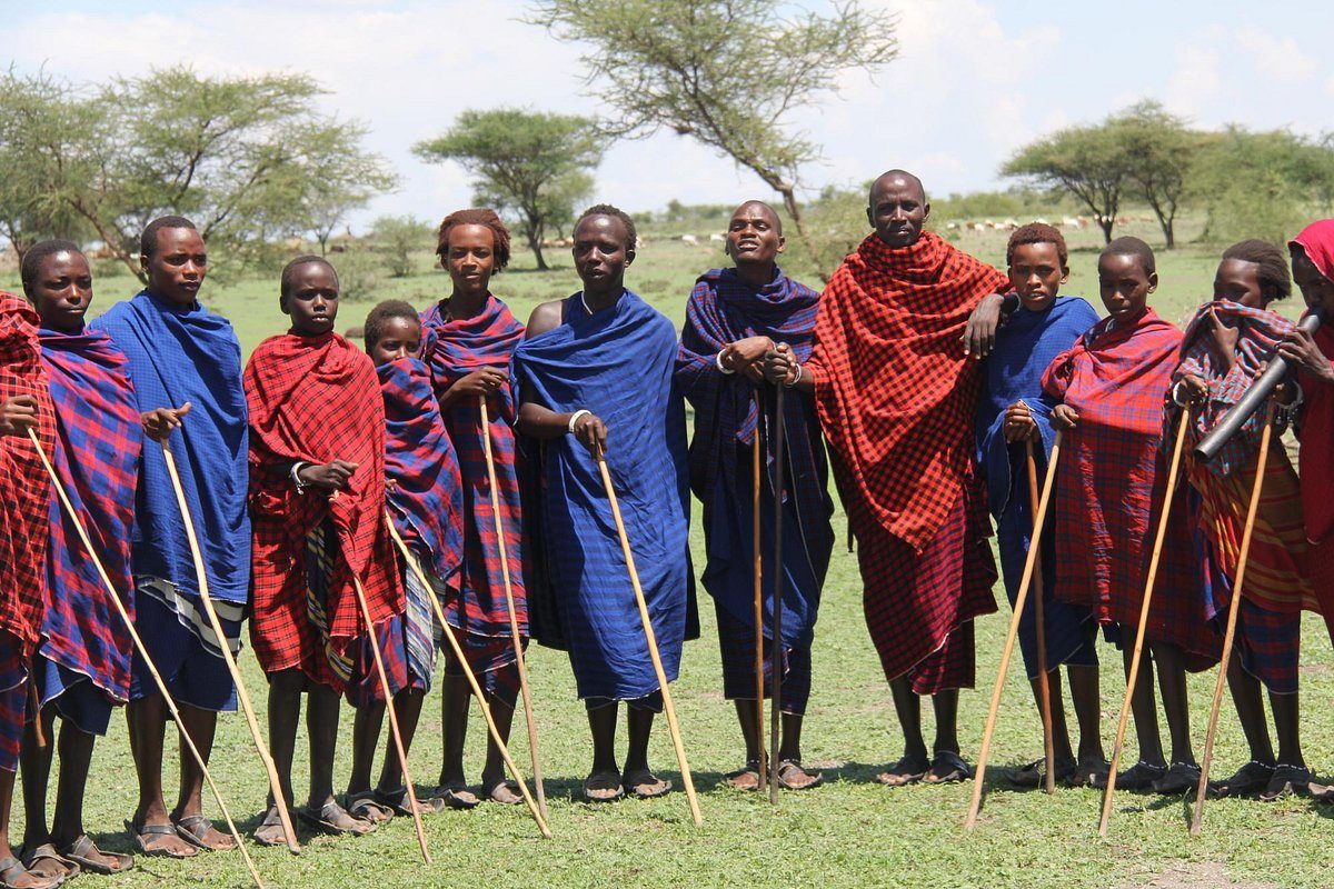 Villagers and visitors together during a community visit
